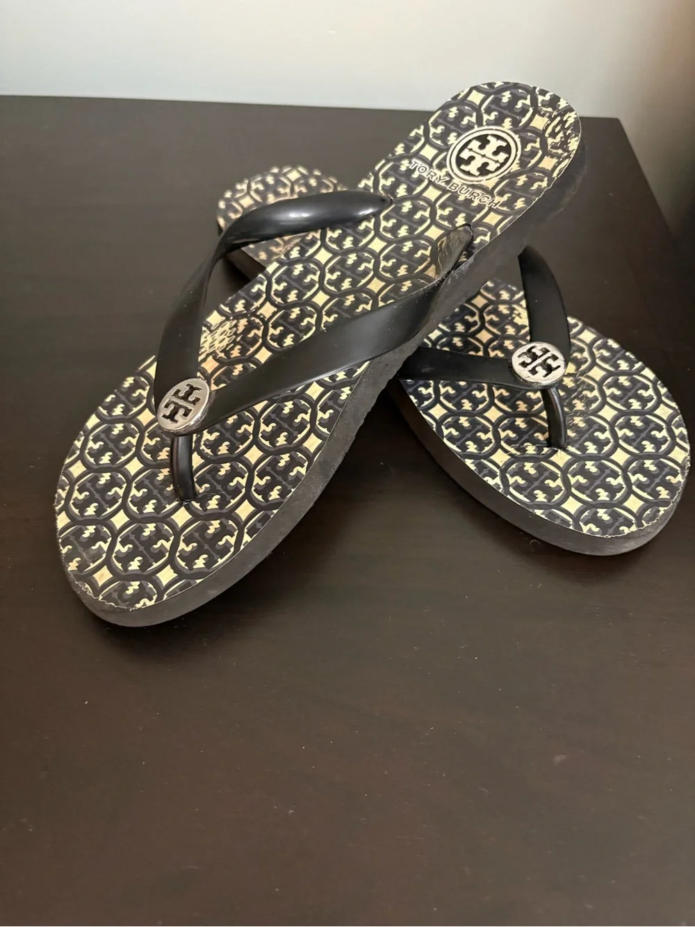 Tory Burch Black and Cream Logo-Pattern Flip Flop Sandals